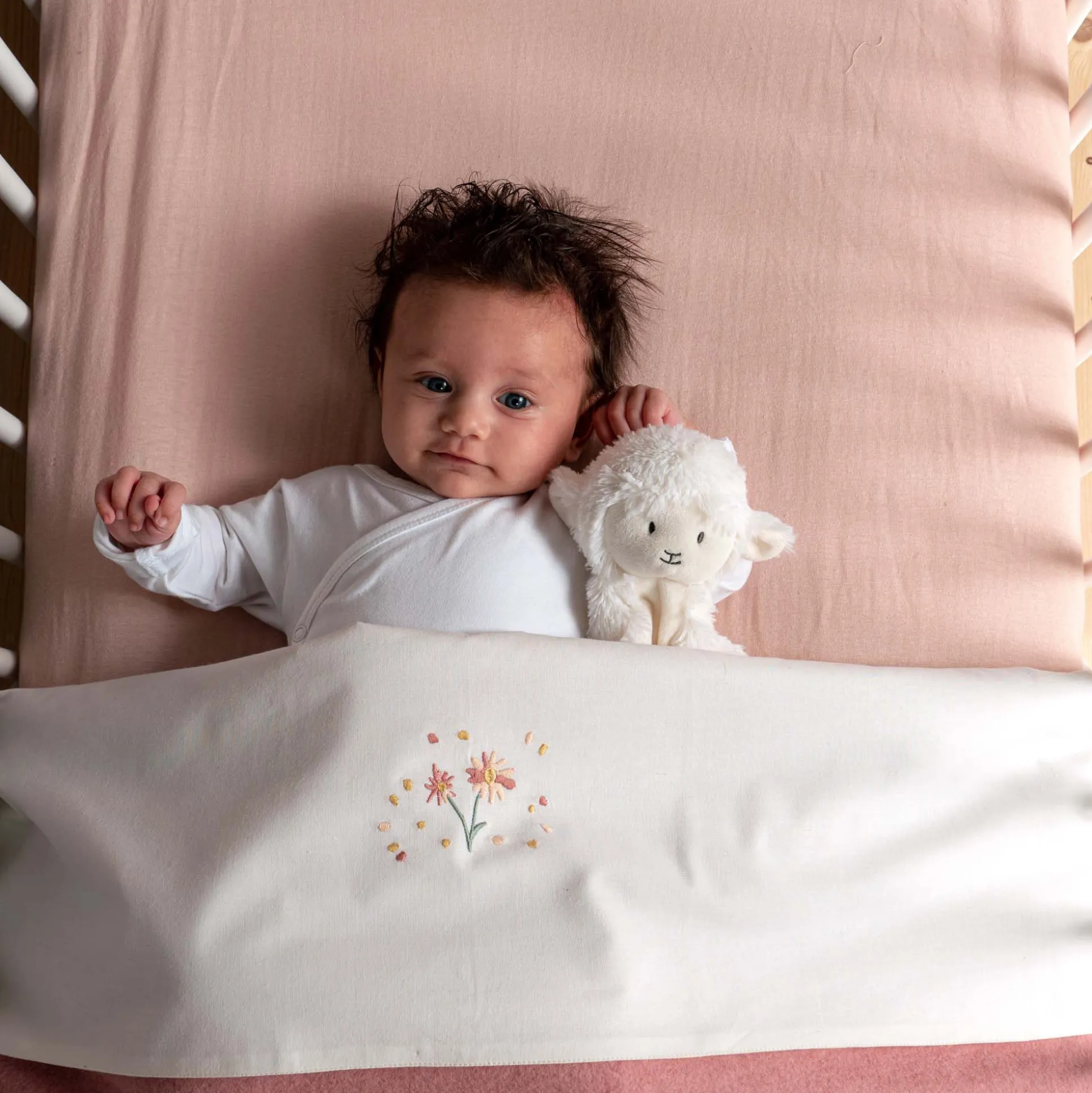 Prénatal wieghoeslaken roze